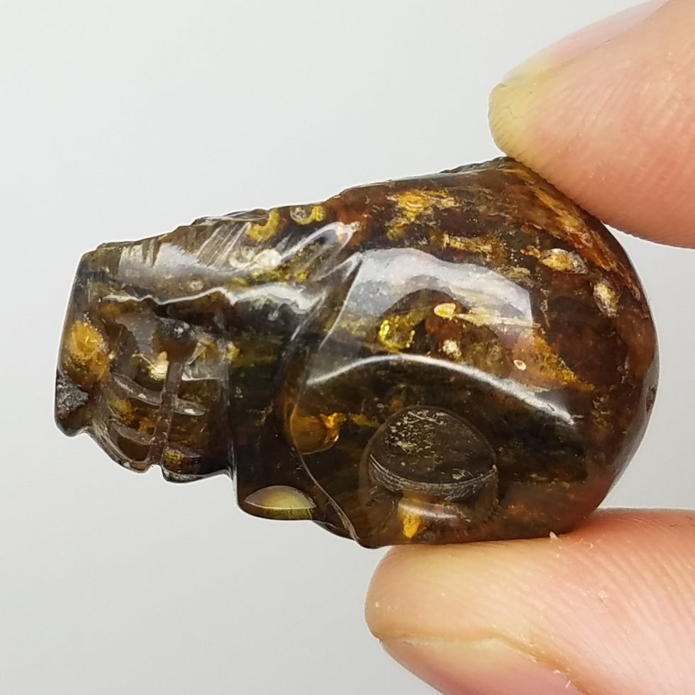 Skull Amber Carving - The Meteorite Traders