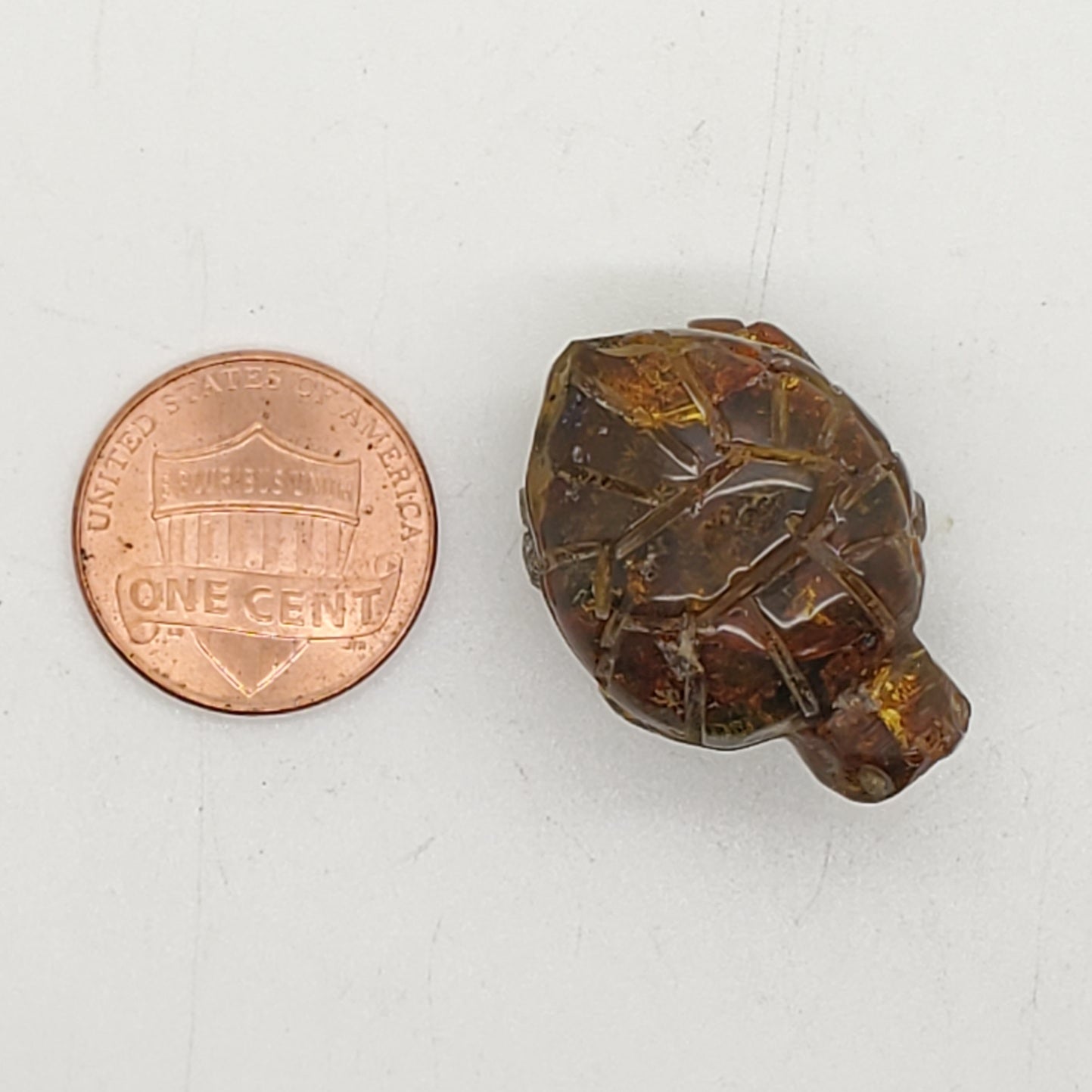 Turtle carving amber uv