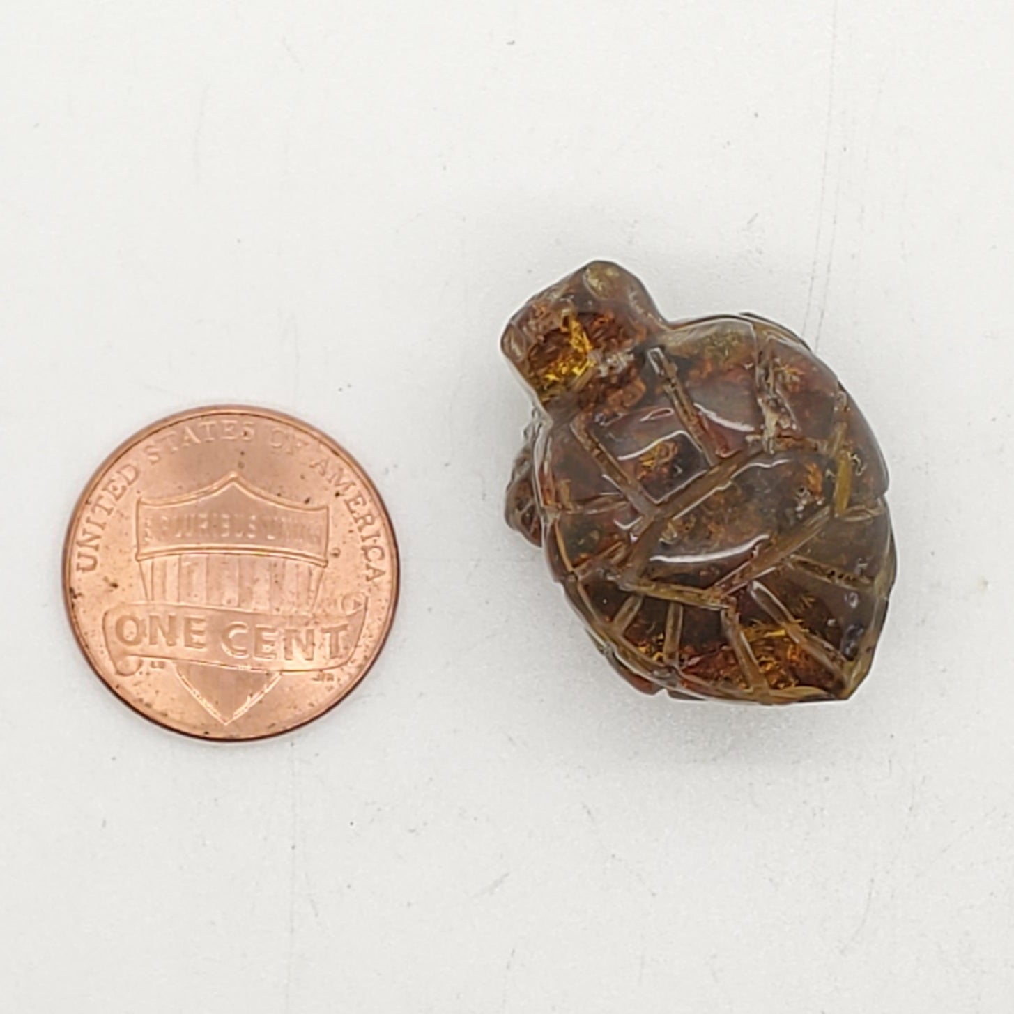Turtle carving amber uv
