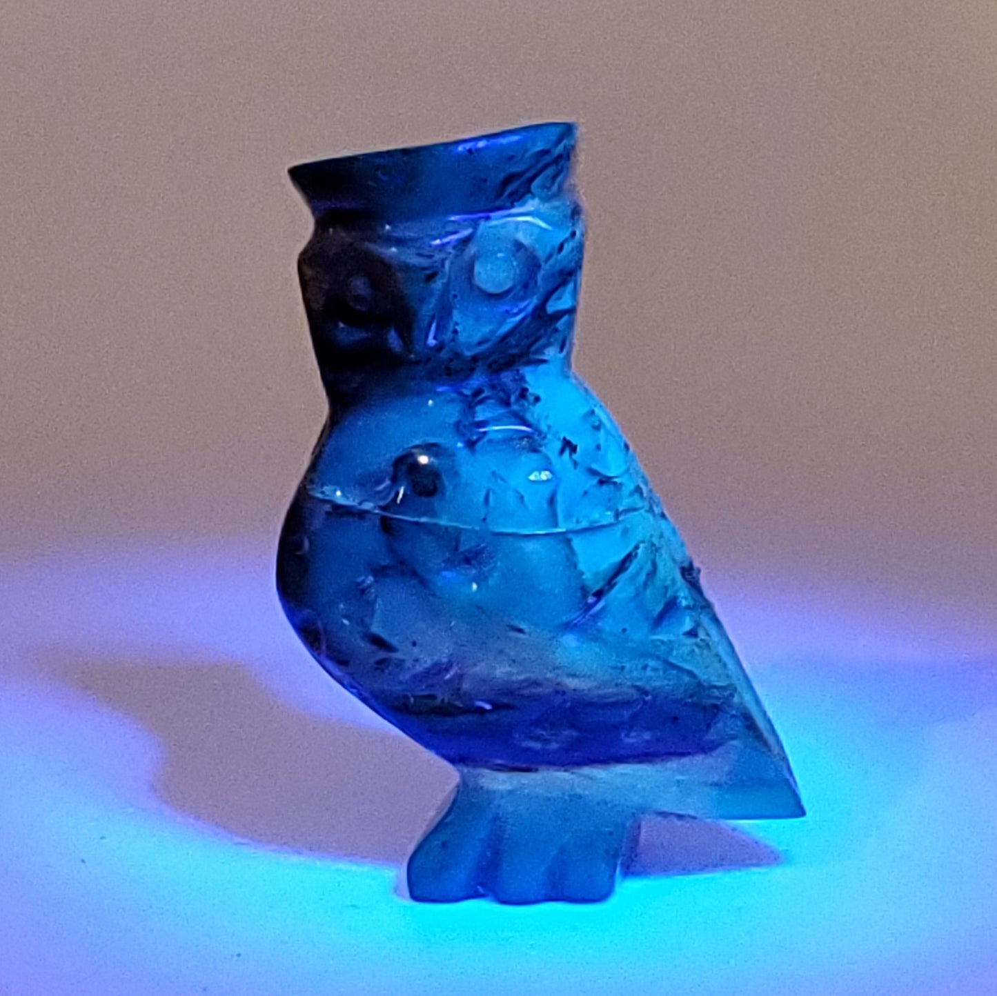 Owl Amber Talisman Carving with UV reaction