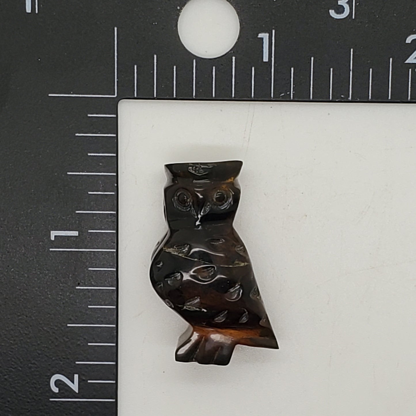 Owl Amber Talisman Carving with UV reaction