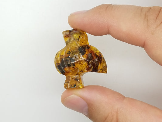 OWL AMBER Talisman Carving with UV reaction
